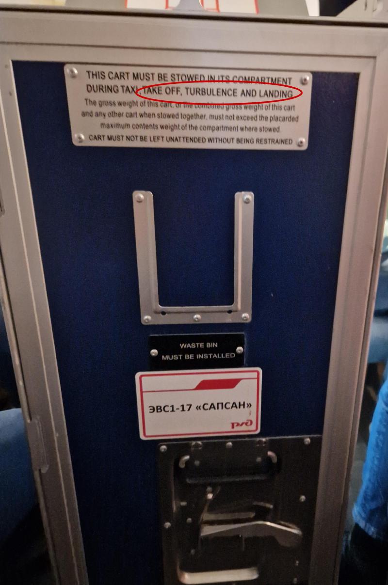 trash bin with an aviation-sourced plaque